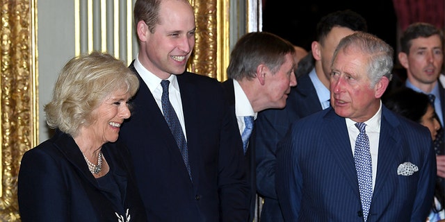 Camilla, Duchess of Cornwall, Prince William, Duke of Cambridge and Prince Charles, Prince of Wales attend the 2018 Commonwealth Day reception at Marlborough House on March 12, 2018 in London, England. — Getty