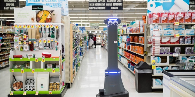 A robot named Marty cleans the floors at a Giant grocery store in Harrisburg, Pa., Tuesday, Jan. 15, 2019.