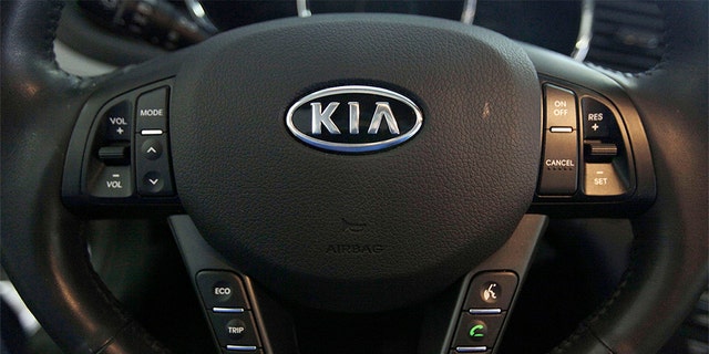 A Kia optima's steering wheel inside a Kia car dealership in Elmhurst, Ill.