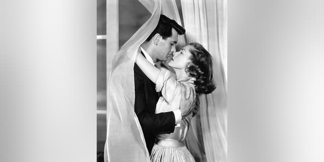 "Written on the Wind" (1956). Directed by Douglas Sirk Shown: Lauren Bacall (as Lucy Moore Hadley), Rock Hudson (as Mitch Wayne).