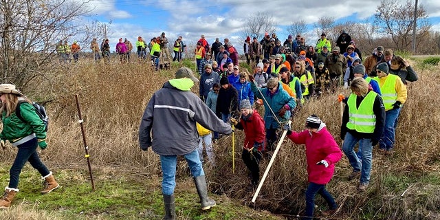 Volunteers search for Jayme Closs near Barron, Wis., who went missing on Oct. 15 after her parents were discovered killed in their home.