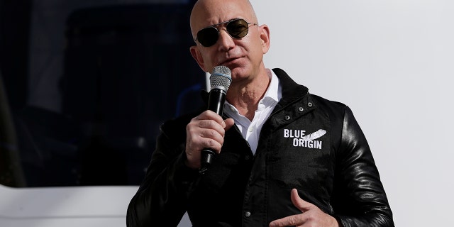 File photo :Amazon and Blue Origin founder Jeff Bezos addresses the media about the New Shepard rocket booster and Crew Capsule mockup at the 33rd Space Symposium in Colorado Springs, Colorado, United States April 5, 2017. REUTERS/Isaiah J. Downing -