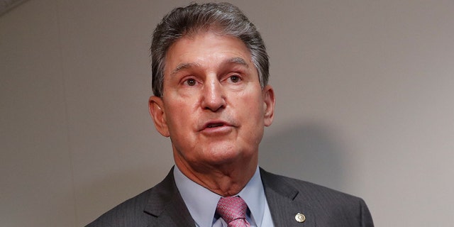 Sen. Joe Manchin, D-W.Va., speaks to members of the media prior to his meeting with CIA Director Nominee Gina Haspel, on Capitol Hill in Washington, Monday, May 7, 2018. Manchin has repeatedly said he opposes court packing and getting rid of the legislative filibuster in the Senate.