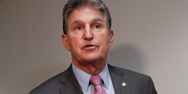Sen. Joe Manchin, D-W.Va., speaks to members of the media prior to his meeting with CIA Director Nominee Gina Haspel, on Capitol Hill in Washington, Monday, May 7, 2018. Manchin has repeatedly said he opposes court packing and getting rid of the legislative filibuster in the Senate.