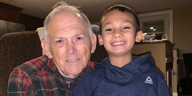 Kazin Crisman was headed for pizza with his grandfather on Saturday when he noticed the 80-year-old struggling to start the car.