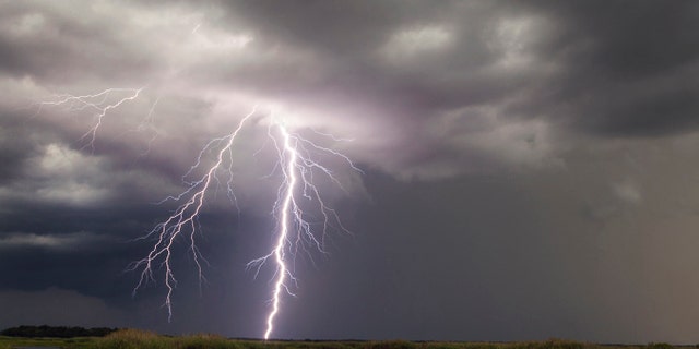 Lightning from a summer storm is seen in Christmas, Fla., July 19, 2015.