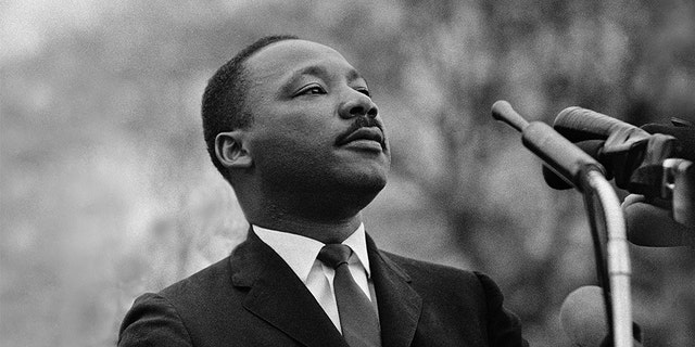 Dr. Martin Luther King, Jr. speaking before a crowd of 25,000 civil rights marchers in front of the state capital building on March 25, 1965, in Montgomery, Ala. (Stephen F. Somerstein/Getty Images)