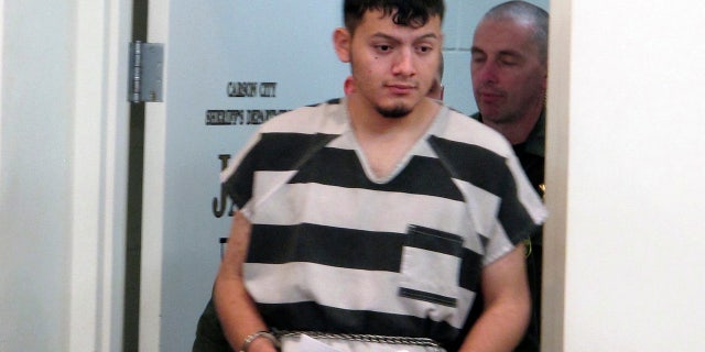 Wilber Ernesto Martinez-Guzman, 19, made his initial court appearance in Carson City Thursday. (AP Photo/Scott Sonner)