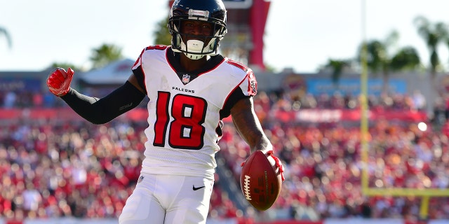 Calvin Ridley of the Atlanta Falcons catches a 7-yard touchdown pass from Matt Ryan during a December 2018 game.