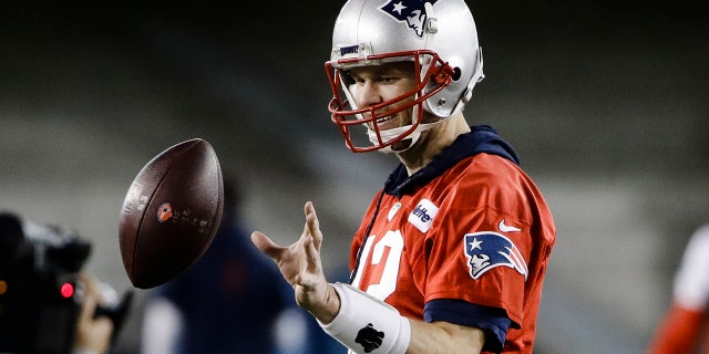 New England Patriots quarterback Tom Brady catches a ball during NFL football practice, Wednesday, Jan. 30, 2019, in Atlanta, as the team prepares for Super Bowl 53 against the Los Angeles Rams.
