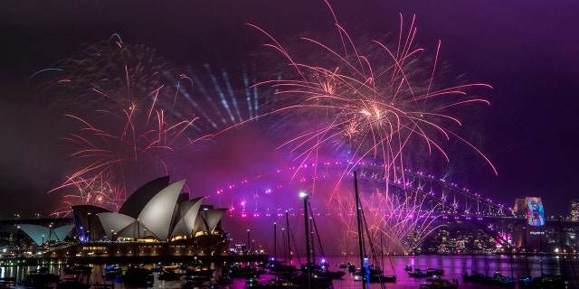 Fireworks explode over the Sydney Harbour during New Year's Eve celebrations in Sydney, Monday, Dec. 31, 2018. (Brendan Esposito/AAP via AP)