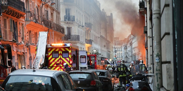 Firefighters respond the scene after A huge blast destroyed buildings and left casualties in French capital Paris on January 12, 2019.