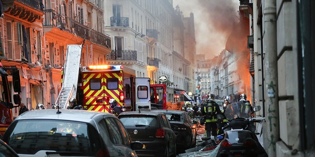 Firefighters respond the scene after A huge blast destroyed buildings and left casualties in French capital Paris on January 12, 2019.