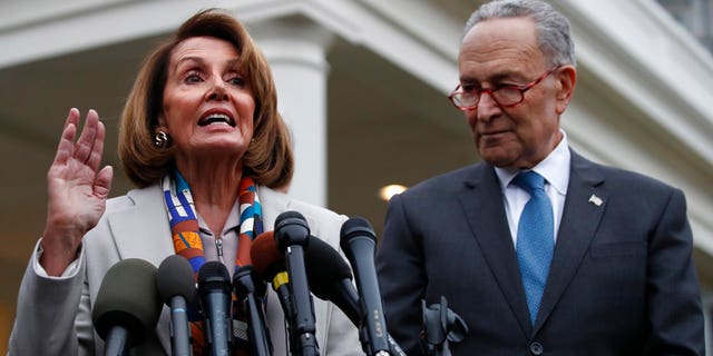 House Democratic leader Nancy Pelosi of California, left, the House Speaker-designate, and Senate Minority Leader Chuck Schumer, D-N.Y., speak to the media after meeting with President Donald Trump, Wednesday, Jan. 2, 2019, on border security at the White House in Washington. (AP Photo/Jacquelyn Martin)
