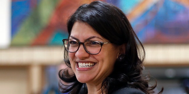 Rashida Tlaib, Democratic candidate for the Michigan's 13th Congressional District, smiles during a rally in Dearborn, Mich., Friday, Oct. 26, 2018. (AP Photo/Paul Sancya)