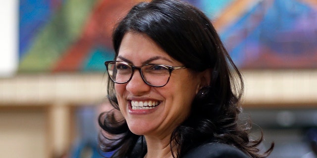 Rashida Tlaib, Democratic candidate for the Michigan's 13th Congressional District, smiles during a rally in Dearborn, Mich., Friday, Oct. 26, 2018. (AP Photo/Paul Sancya)