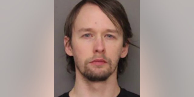 Robert Cronin, 33, was charged with the sexual assault of an 11-year-old girl, impregnating her, but has claimed that is was actually his clothes that led to her pregnancy, not sex, a report said Wednesday.