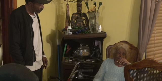 Malbrth Moses (left) and his 95-year-old mother (right) are one of many Houstonians still recovering after Hurricane Harvey. Moses says their home is far from being completely repaired.