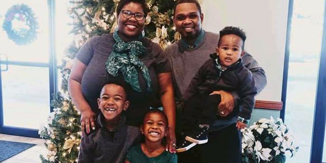 The Shaw family at Christmas: LaKenya, 38, Allen, 39, Josiah, 7, Naomi, 5, and Matthew, 2,