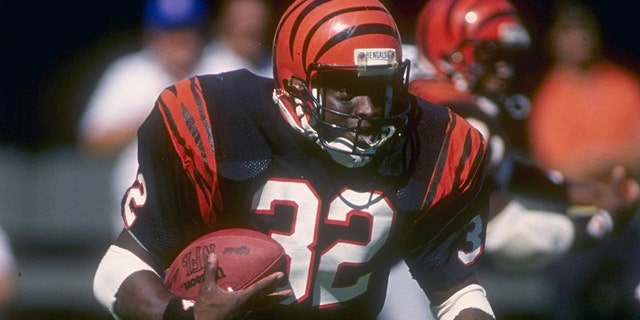 25 Sep 1988: Running back Stanley Wilson of the Cincinnati Bengals moves the ball during a game against the Cleveland Browns at Riverfront Stadium in Cincinnati, Ohio. The Bengals won the game, 24-17.