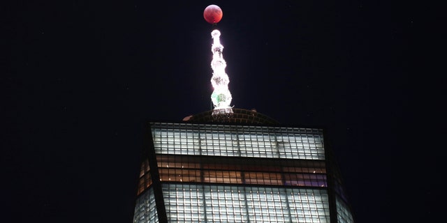 The super blood Moon photographed above One World Trade Center in Manhattan.