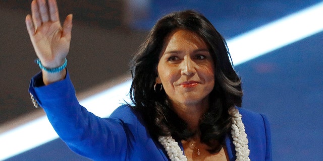 U.S. Representative Tulsi Gabbard (D-HI) waves after making a nomination speech for Senator Bernie Sanders at the Democratic National Convention in Philadelphia, Pennsylvania, U.S. July 26, 2016. REUTERS/Scott Audette