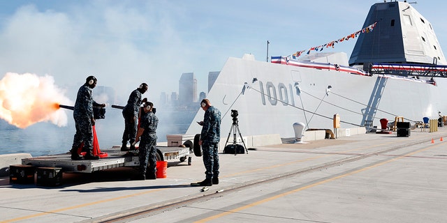 SAN DIEGO (Jan. 26, 2019) Sailors assigned to the Naval Base Coronado security department fire a 19-gun salute during the commissioning ceremony for the Zumwalt-class guided-missile destroyer USS Michael Monsoor (DDG 1001). (U.S. Navy photo by Mass Communication Specialist 1st Class Peter Burghart/Released)