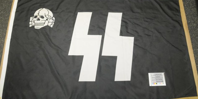 Other items in Stolper’s apartment included this SS flag, what appeared to be a Nazi calendar and a copy of Hitler’s notorious autobiography, “Mein Kampf.”