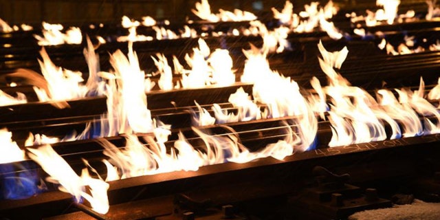 Metra, a Chicago railroad, says it uses flares of gas heaters to heat the metal until it expands so the rails do not break in the cold.