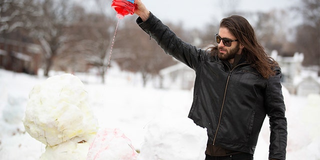 The herd of snowmen, which were colored red, blue and yellow, soon morphed into “a pop-up art installation” as people in the area learned about them, the university said. Paul has named the collection “Love Army.”