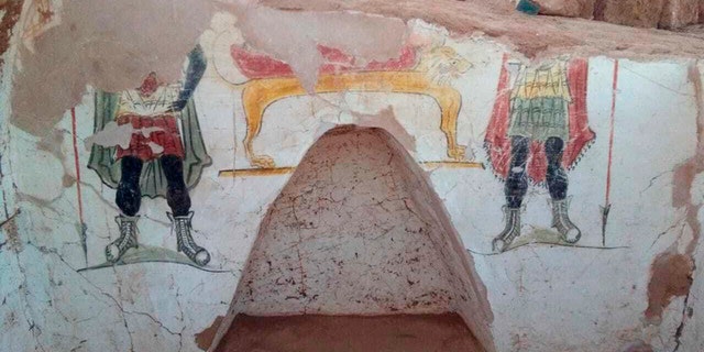 This undated handout photo from the Egyptian Antiquities Authority, shows colorful funeral paintings in an ancient tomb dating back to the Roman period, at the Dakhla Oasis in the Western Desert, Egypt. (Egyptian Antiquities Authority via AP)