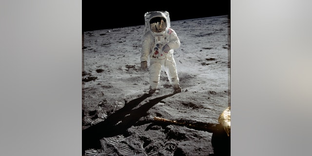 Astronaut Buzz Aldrin in his iconic Apollo spacesuit poses for a portrait on the moon during the Apollo 11 lunar landing mission in July 1969.