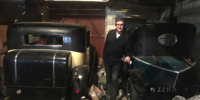 Artcurial director Matthieu Lamoure was with the team that recoverd the Bugattis along with the Citroen Torpedo he is leaning on in this photo.