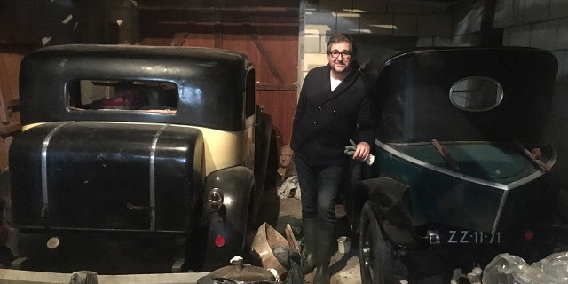 Artcurial director Matthieu Lamoure was with the team that recoverd the Bugattis along with the Citroen Torpedo he is leaning on in this photo.