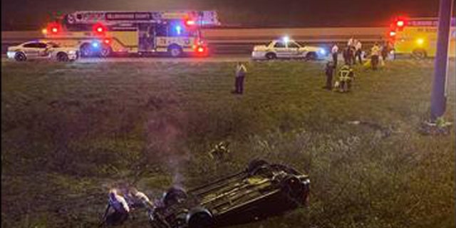 Hillsborough County deputies in Florida rescued a woman who called 911 after flipping her car into "water and muck" off I-4 just outside of Tampa on New Year's Day.