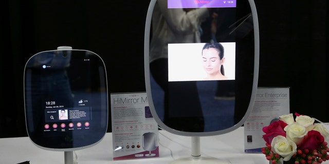 Two different sizes of the HiMirror uses its skin analysis technology, to assess your skin for wrinkles, fine lines, dark circles, dark spots, red spots, roughness, and pores, shown here at the CES Unveiled at CES International, Sunday, Jan. 6, 2019, in Las Vegas. (AP Photo/Ross D. Franklin)
