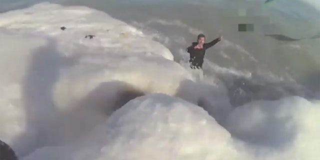 The man had to be rescued near Foster Beach on the city's North Side on Sunday.