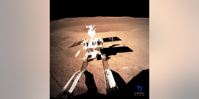 In this photo provided on Thursday, Jan. 3, 2019, by China National Space Administration via Xinhua News Agency, Yutu-2, China's lunar rover, leaves wheel marks after leaving the lander that touched down on the surface of the far side of the moon.