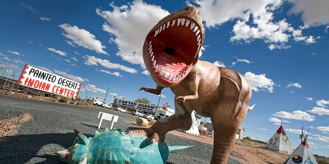 A dinosaur model greets visitors near Arizona's Painted Desert.