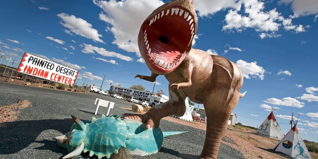 A dinosaur model greets visitors near Arizona's Painted Desert.