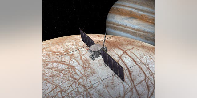 An artist's depiction of the Europa Clipper spacecraft at work near Jupiter's moon Europa.