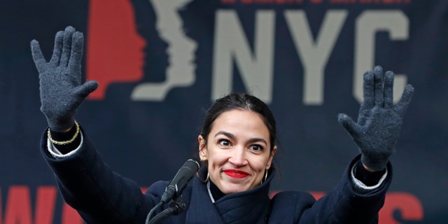 U.S. Rep. Alexandria Ocasio-Cortez, (D-New York) waves to the crowd after speaking at Women's Unity Rally organized by Women's March NYC at Foley Square in Lower Manhattan, Saturday, Jan. 19, 2019, in New York. Ocasio-Cortez had been extremely critical of Amazon's planned New York headquarters. (AP Photo/Kathy Willens)