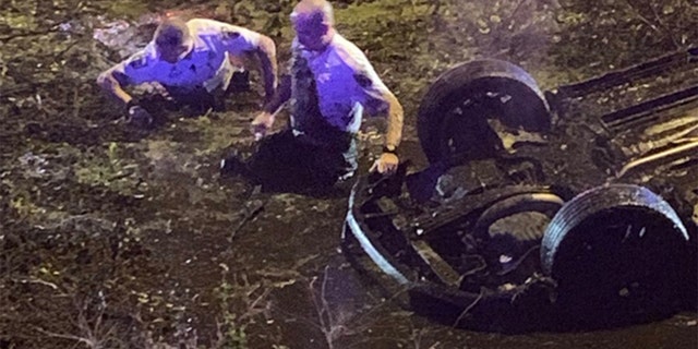 Florida Deputies Rescue Near-drowning Woman After Crash Into Muddy ...