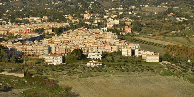 Local officials on southern Italy’s island of Sicily have put dozens of hilltop homes on the market.