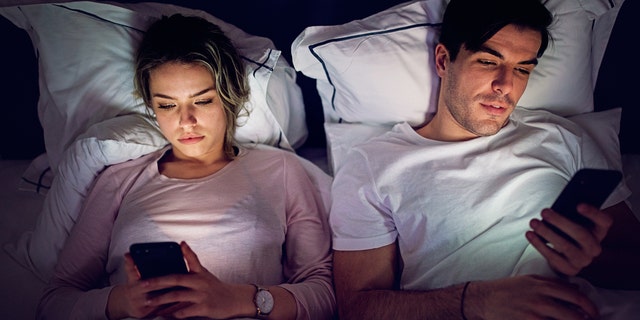 If this scene looks familiar, fix it: Sleep experts advise against viewing phones or screens late at night or right before bedtime. (iStock)