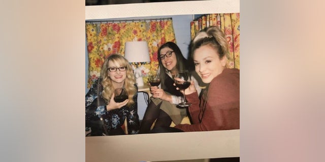 FILE: Kaley Cuoco shares a drink with cast members of "The Big Bang Theory," Nov. 1, 2018.