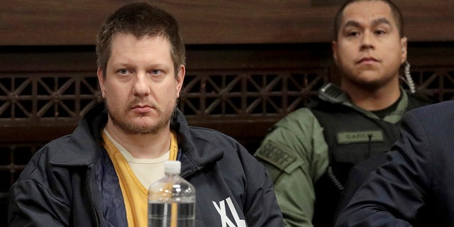 FILE - in this Dec. 14, 2018, file photo, former Chicago police Officer Jason Van Dyke, left, appears for a hearing at the Leighton Criminal Court Building, in Chicago. (Antonio Perez/Chicago Tribune via AP, Pool, File)