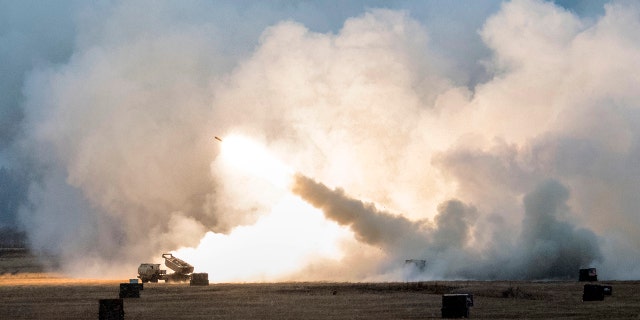 U.S. Army soldiers fire an M142 High Mobility Artillery Rocket System at Fort Greely in Alaska in October.