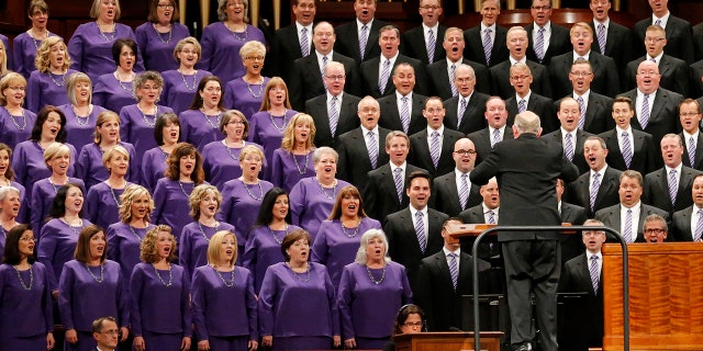 FILE - In this Oct. 6, 2018 file photo, female and male members of The Tabernacle Choir perform during the twice-annual conference of The Church of Jesus Christ of Latter-day Saints in Salt Lake City. (AP Photo/Rick Bowmer, File)