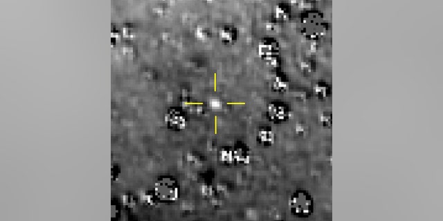 FILE - This composite image made available by NASA shows the Kuiper Belt object nicknamed "Ultima Thule," indicated by the crosshairs at center, with stars surrounding it on Aug. 16, 2018, made by the New Horizons spacecraft. (NASA/Johns Hopkins University Applied Physics Laboratory/Southwest Research Institute via AP)